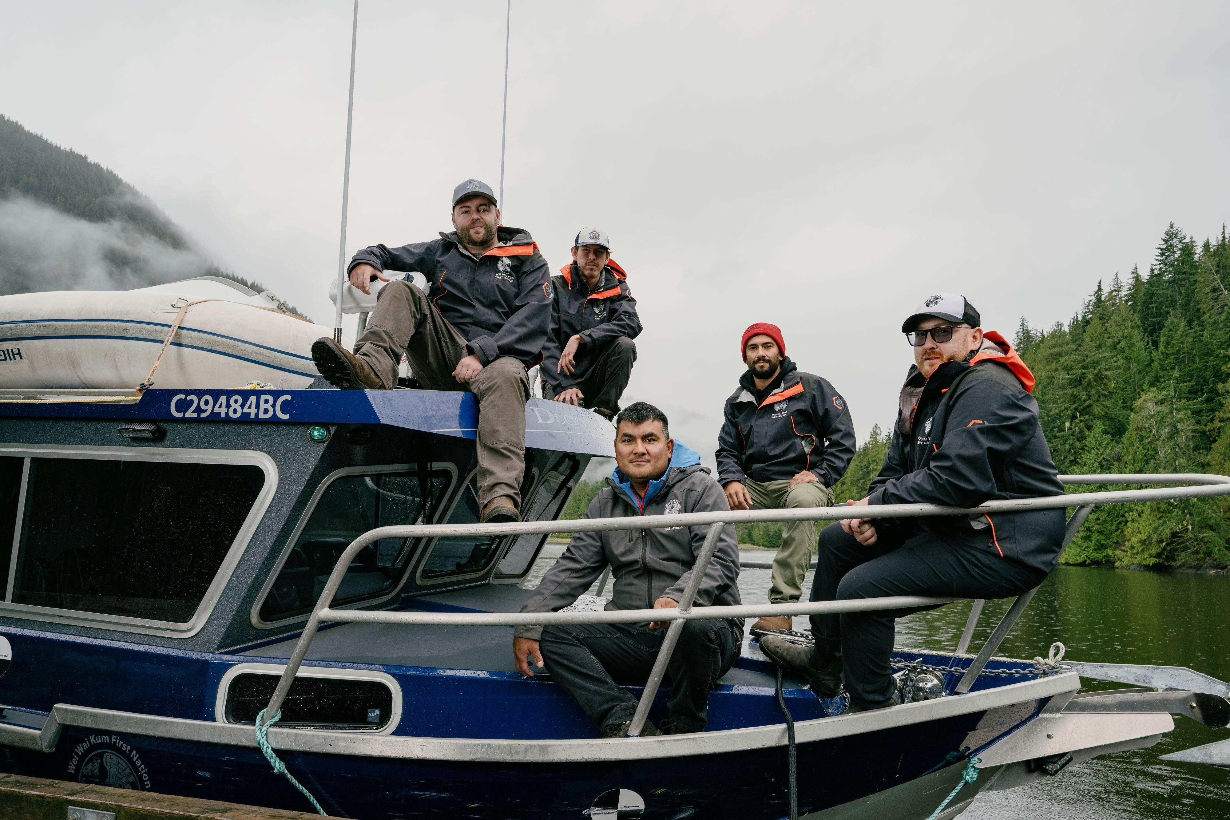The Wei Wai Kum Guardians on their boat at the Homayno Bay restoration project. From left to right:  Danny Hurry, Payton Wilson-Wells, Samuel "Joey" Riveau, Jordon Labbe, Ivan Dick.
